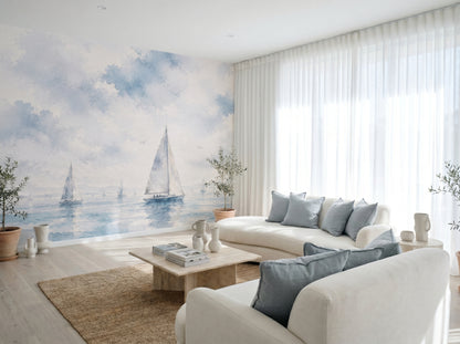 Coastal sailboat wallpaper mural with soft cloudy sky
