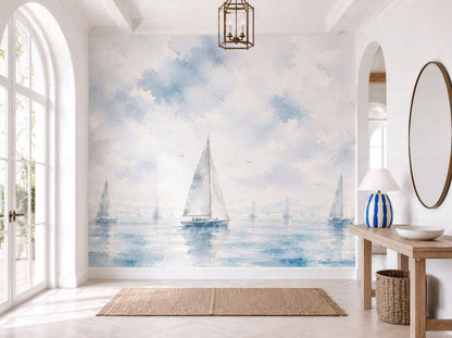 Coastal sailboat wallpaper mural with soft cloudy sky
